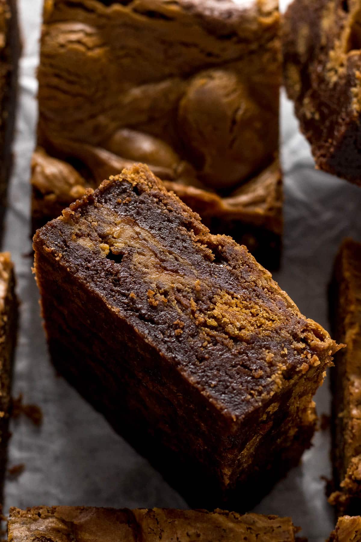 Sliced Biscoff brownie showing the cookie and biscoff swirls.