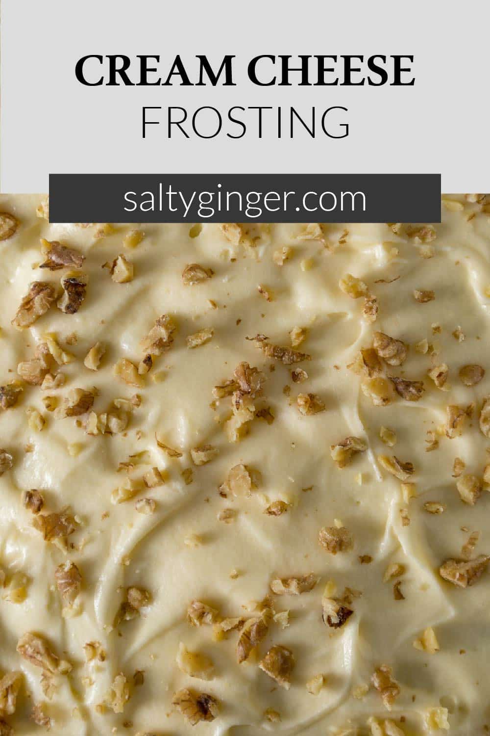 Pin - Cream cheese frosting sprinkled with walnut pieces.