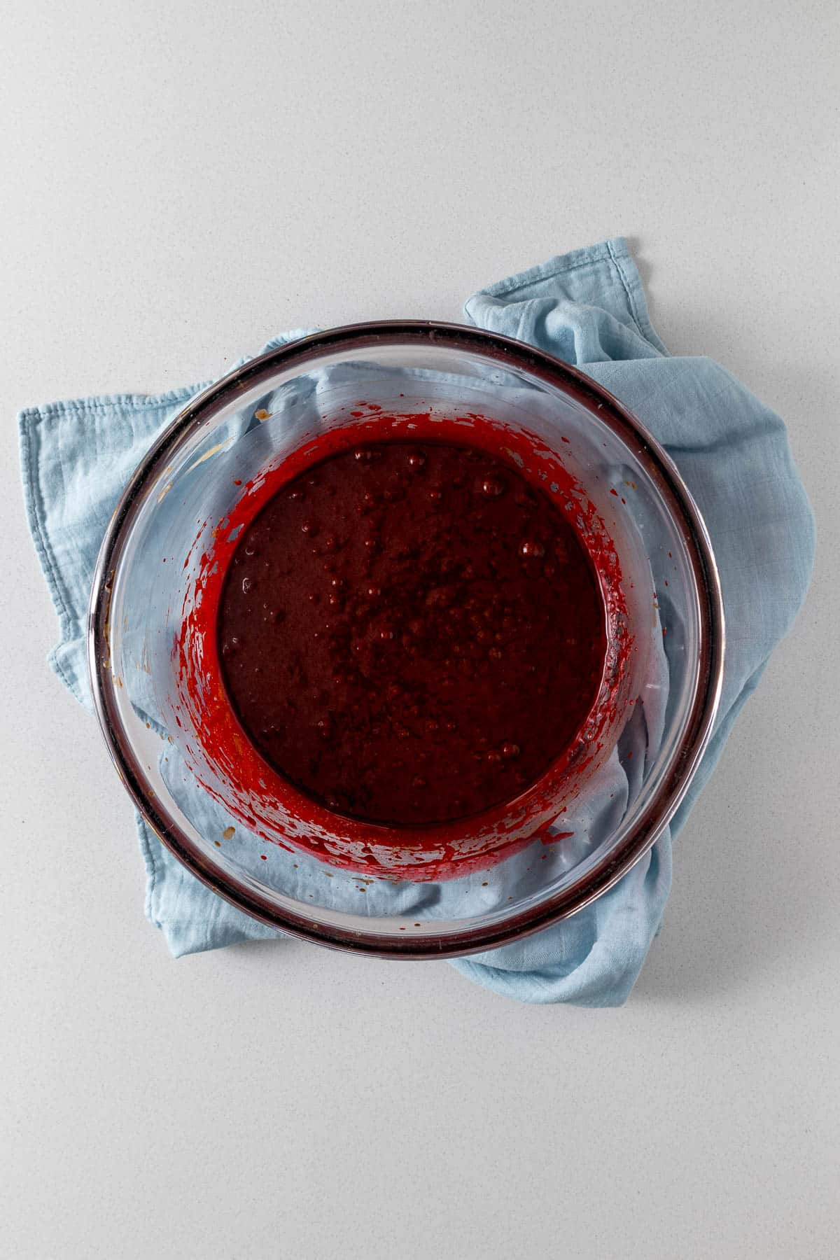 Step 5 - slightly frothy brownie batter with food coloring added. 