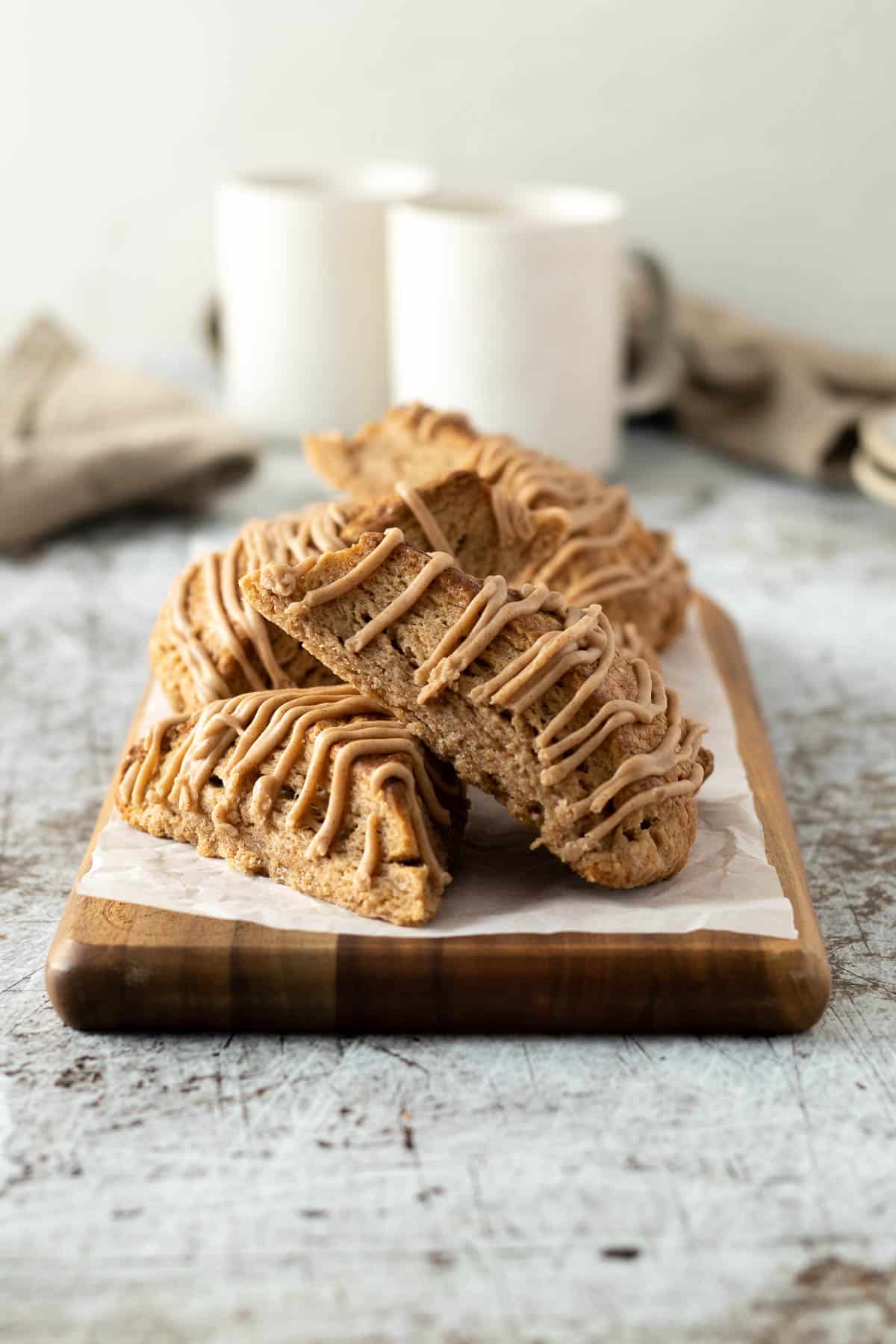 Cinnamon scones on a board.