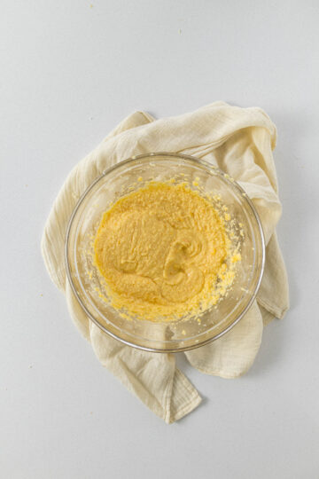Step 4 - Eggs beaten into the creamed butter and sugar.