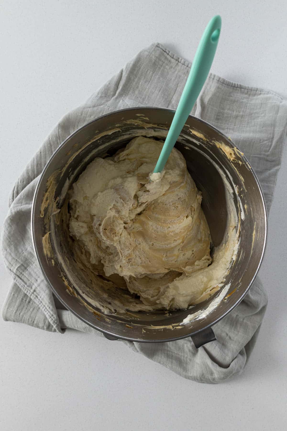 Step 9: Whipped cream being folded into the cream cheese mixture.
