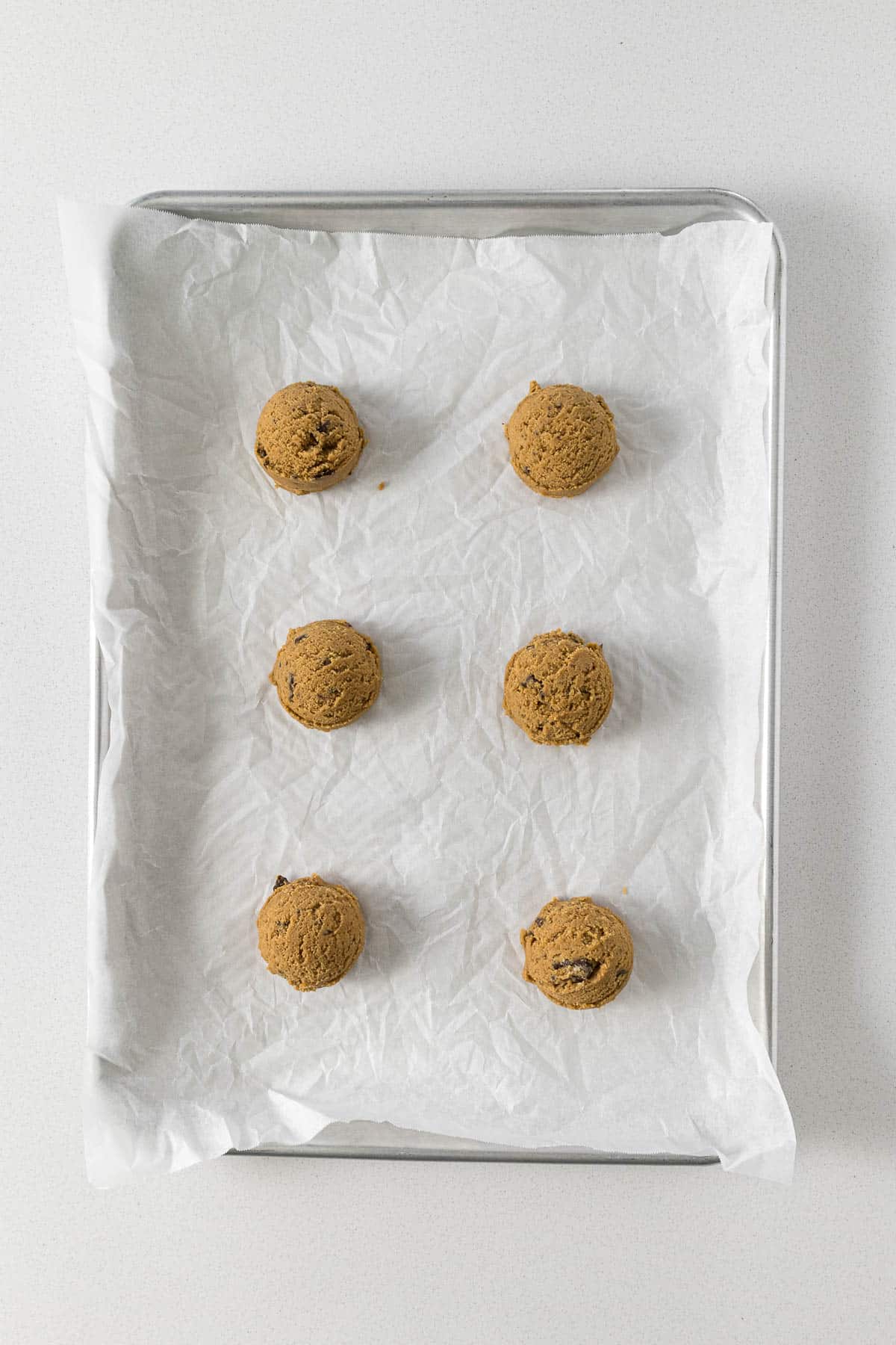 Step 6 - Coffee cookies portioned and placed on a baking tray with enough space for them to spread.