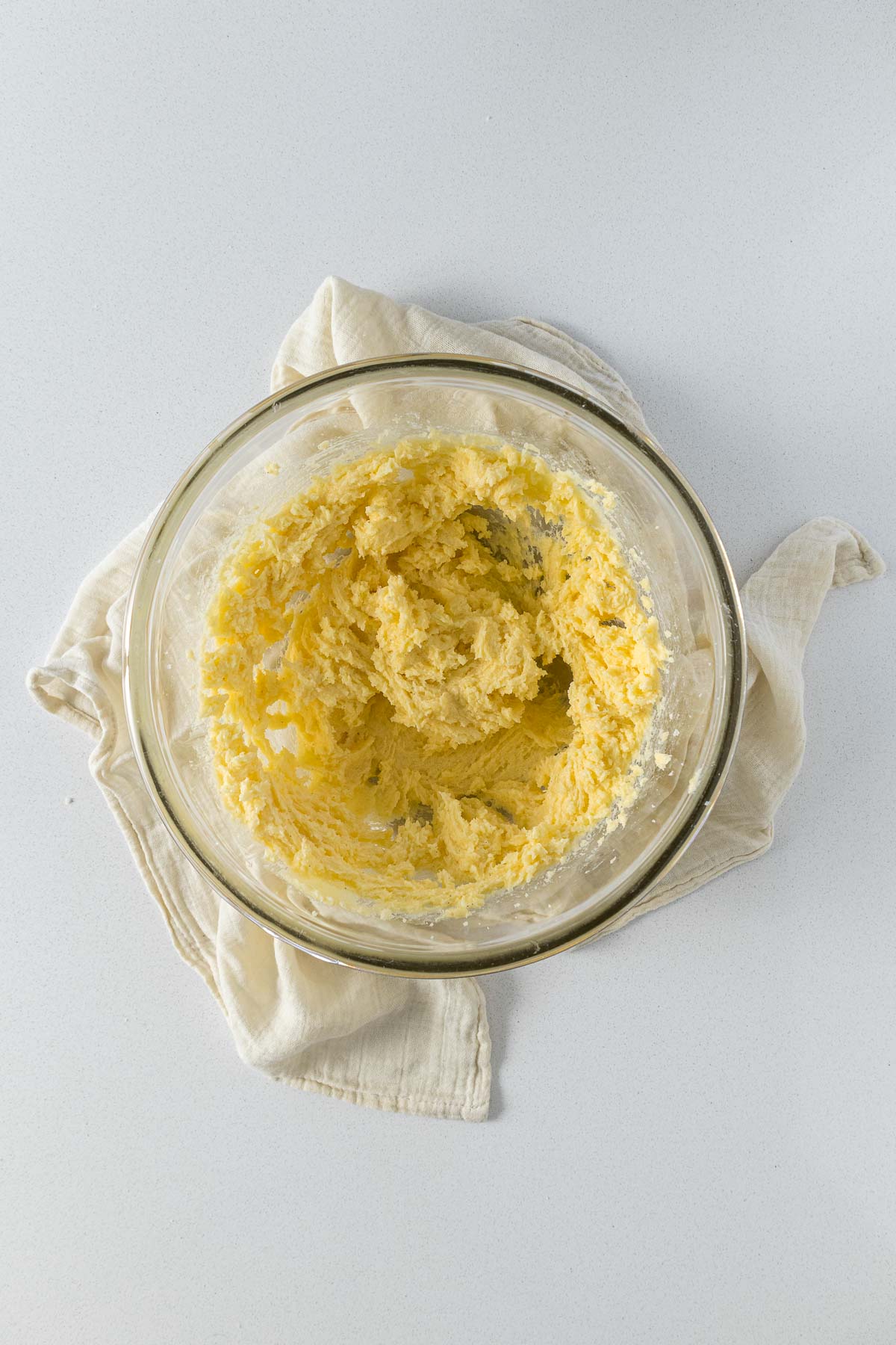 Step 3 - Vanilla and eggs beaten into the creamed butter and sugar.