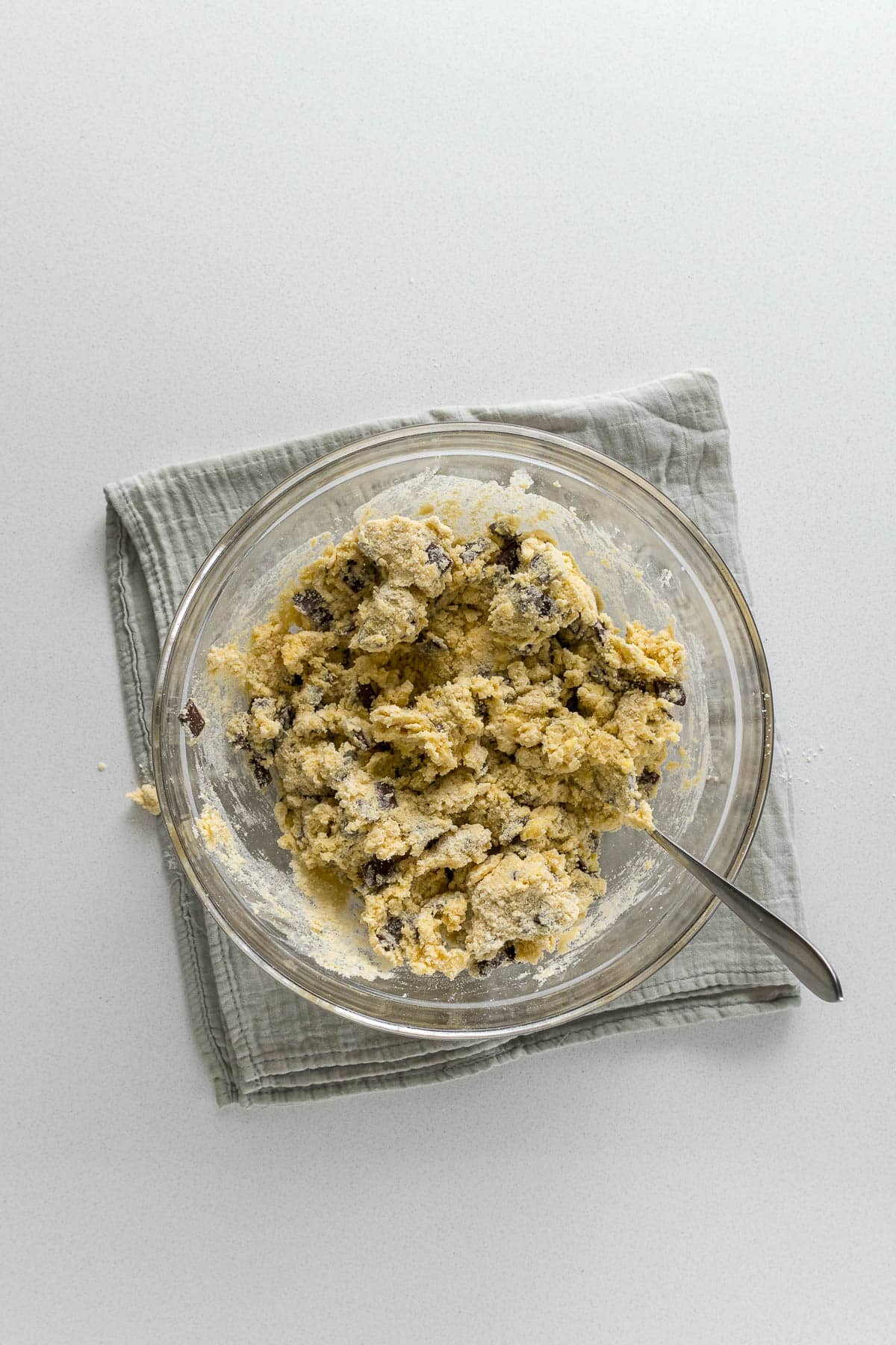 Step 4 - Chocolate chips, sugar, cream and vanilla mixed into flour until most of the flour is moist.