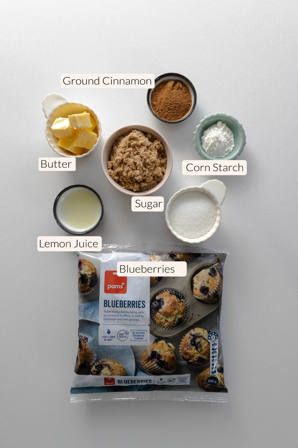 Blueberry cinnamon rolls filling ingredients - blueberries, lemon juice, sugar, butter, corn starch, ground cinnamon.