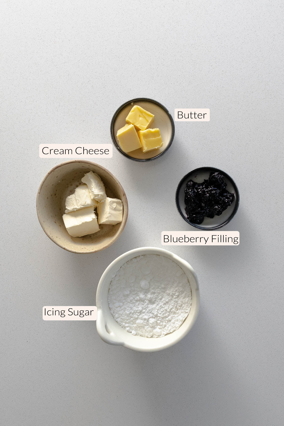 Blueberry cream cheese frosting ingredients - blueberry filling, cream cheese, butter and icing sugar.