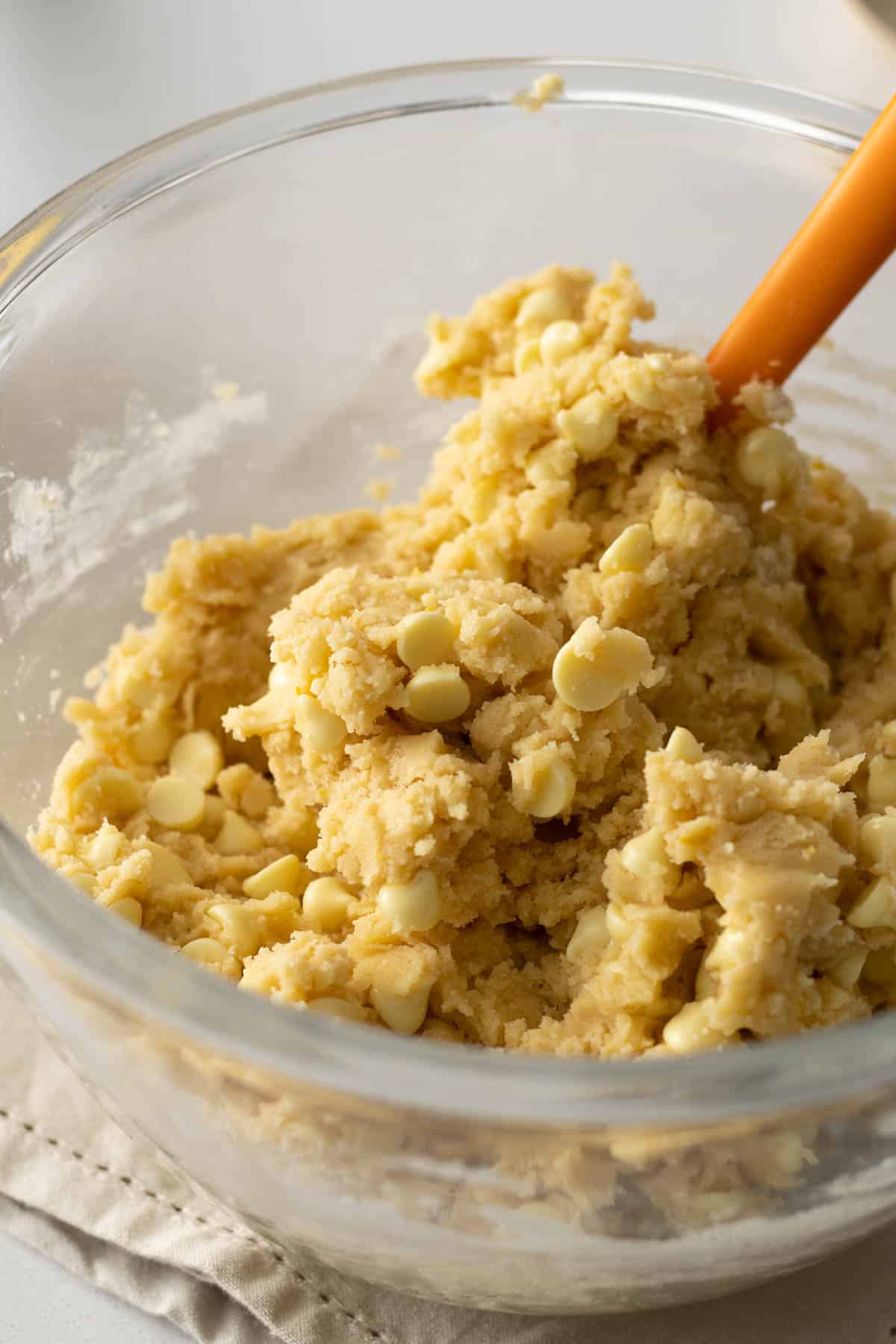 Step 6 - White chocolate lemon cookie dough in a mixing bowl.