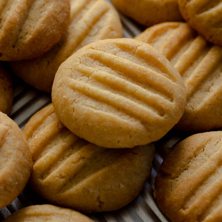 Condensed milk cookies on a baking sheet.